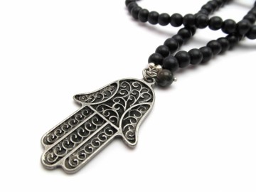 Zwarte Kettinghamsa hand