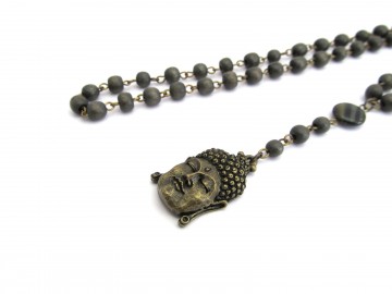 Ketting boeddha bron