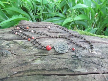 Ketting boeddha koraal bosfoto